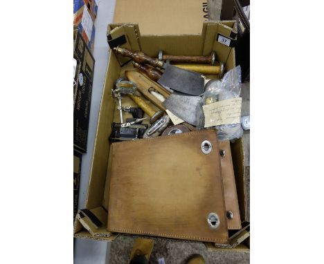 A collection of metalware items to include hand made decorative axes, watch makers parts, cigarette lighters, super k tester 