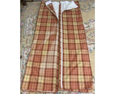 Two pair heavy orange checked curtains (1 mtr wide x 225 L) . One curtain sun bleached)
