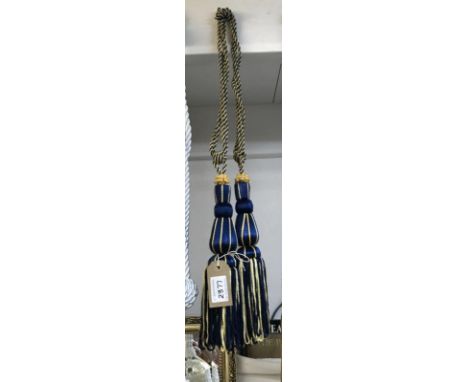 Royal blue and gold curtain tie backs with tassels