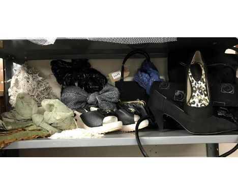 A shelf of bags, scarves and shoes