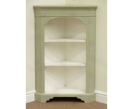 Rustic soft green painted ash three tier corner display shelf, raised on bracket feet, W71cm, H108cm