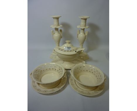 Pair Creamware candlesticks H30cm, tureen with saucer and ladle, and a pair of pierced baskets with stands