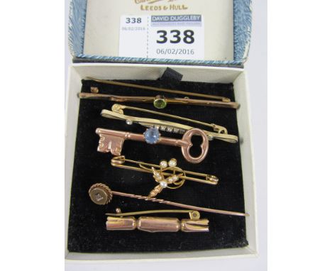 Peridot bar brooch stamped 9ct, seed pearl bar brooch and four others