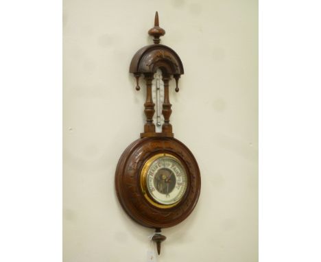 Edwardian walnut aneroid barometer, carved and turned detail, H48cm 