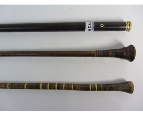 19th century lignum vitae walking cane with bone mounts; a walking cane inscribed 'J S Bramley 1919' and a short stick with r