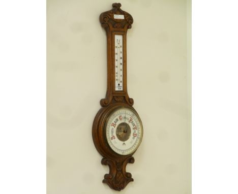 Early 20th century barometer in carved oak case, H81cm