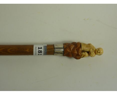 Early 20th century walking stick the handle set with a Chinese carved ivory seated figure