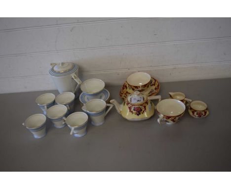 CROWN DUCAL WARE TEA FOR TWO COMPRISING DECO STYLE TEA POT, MILK JUG, SUGAR BOWL AND TWO CUPS AND SAUCERS TOGETHER WITH A FUR