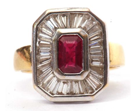 Modern Art Deco style cocktail ring, the centre rectangular cut ruby is bezel set within a baguette diamond surround, panel s