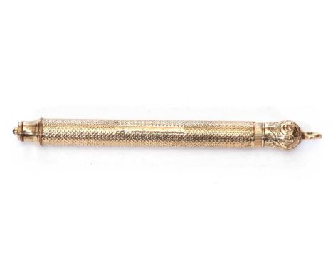 Vintage gold filled propelling pencil, the barrel with engine turned decoration, 7cm long