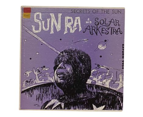 SUN RA AND HIS SOLAR ARKESTRA - SECRETS OF THE SUN LP (SATURN 9954) SIGNED COPY. Astronomically rare one here. Original US is