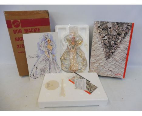 A boxed Mattel Bob Mackie Platinum Barbie, in trade pack.