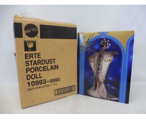 A boxed rare Mattel ERTE Stardust porcelain doll, believed to have been one of 250 dolls made for Hamleys.