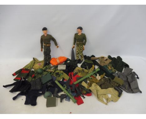 Two 1970s Action Man figures and a selection of clothing, guns and accessories.