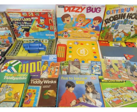 A collection of mainly 1960s/1970s boxed games to include Chad Valley Give a Show Projector, a Post Office play set, a Robin 