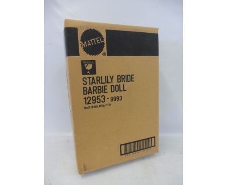 A boxed Mattel Starlily Bride Barbie, in trade pack.