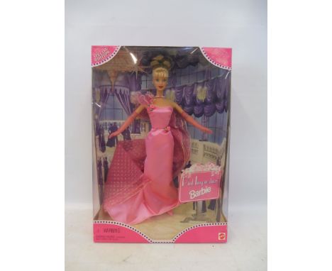 A boxed Mattel Pink Inspiration Barbie.