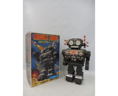 A boxed Missile Robot, battery operated, made by S.H.