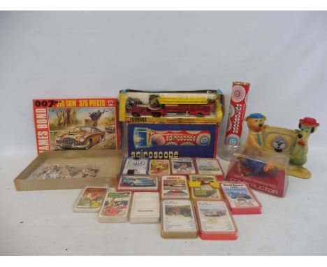 An interesting box of mixed toys to include a Corgi Major American fire engine, a quantity of Top Trump cards and original Ja