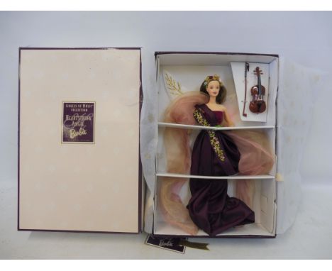A boxed Mattel Heartstring Angel Barbie.