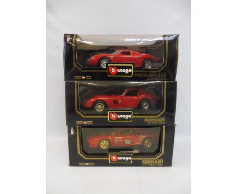 Three boxed Burago 1/18 scale Ferraris.