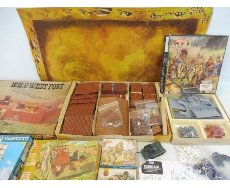 A boxed Timpo wild west fort, a boxed Airfix Ceasar's gate and other Airfix soldiers, ho/oo gauge.