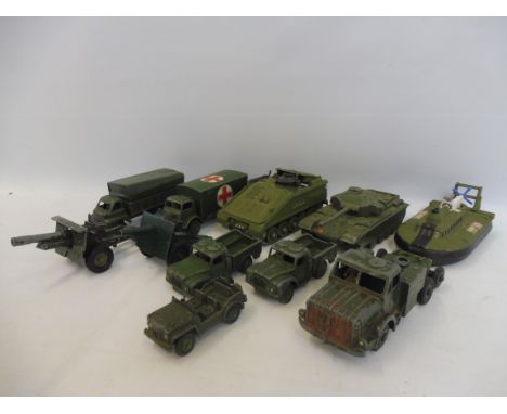 A small selection of playworn Dinky and Corgi military vehicles.