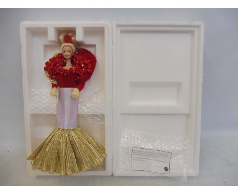 A boxed Mattel golden anniversary Barbie doll, in trade pack, excellent condition.