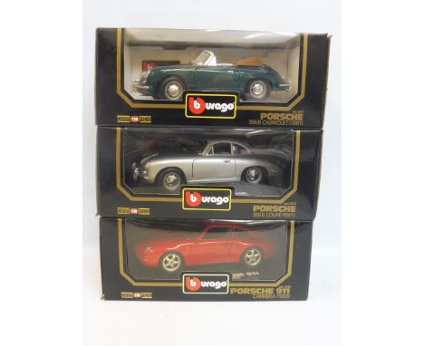 Three boxed Burago 1/18 scale models, all Porsches of different eras.