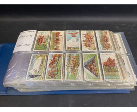 A large album of Players cigarette cards including some unusual sets, noted are Army Life October 1910, Life on board a man o