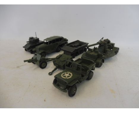 A collection of 1940s Dinky military vehicles including Jeep and light tank.