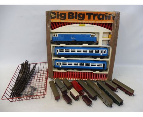 A large garden scale Blue Flyer set, and a selection of carriages, rolling stock etc.