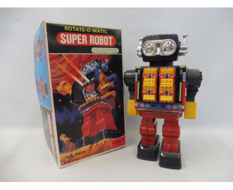 A boxed Rotate-O-Matic Super Robot, battery operated made by S.H.