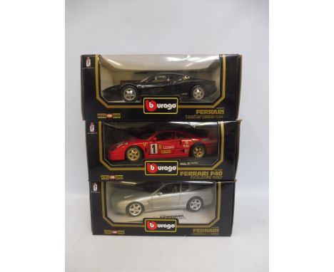 Three boxed Burago 1/18 scale models, all Ferraris of different eras.