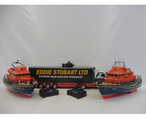 A large scale remote controlled Eddie Stobbart lorry, H777 plus two RNLI remote controlled life boats.