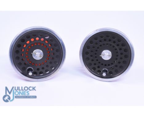 A pair of Hardy Bros Marquis 10 spools, very light use, in cloth bag. (2)
