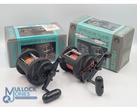 A pair of Daiwa Sealine SL 175 H multi disc drag multiplier reels, large 'T' counter balanced handle, on/off check, both in c