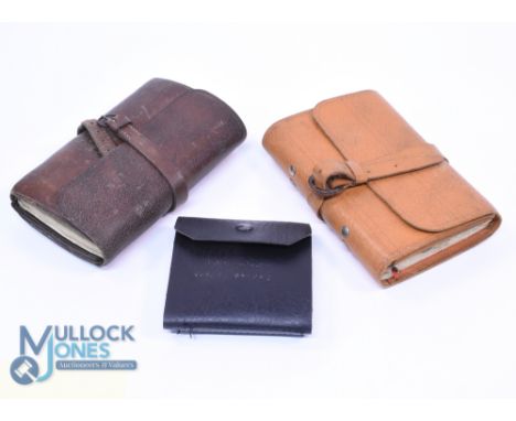 A collection of leather fishing wallets, as follows: Unnamed light tan wallet with wrap around strap, pockets with tool loops