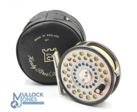 A fine Hardy Bros "LRH Lightweight" alloy trout fly reel, 3 3/16" ventilated spool, 2 screw latch, black handle, milled rim t