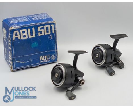 A pair of Abu 501 closed face reels, both run well, one in original box with instructions and spanner, one missing handle cap