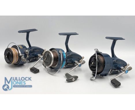 A pair of Mitchell 440A fixed spool reels, blue finish, both with good bail and bail lock; Mitchell 410A good bail, light use