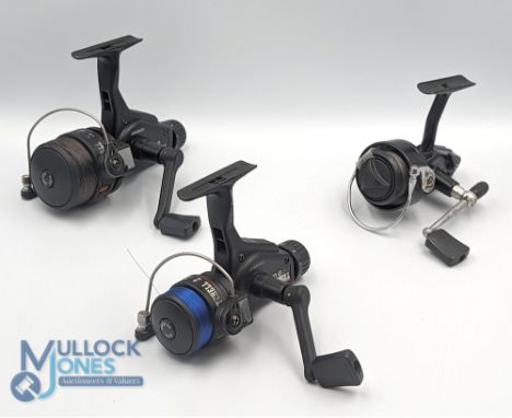 A collection of Mitchell fixed spool reels, all with good bails: 1160G graphite with rear tensioner, light use; 1120G graphit