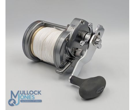 Shimano Torium 30 polished alloy multiplier sea reel, oversized, rubber handle, real seat clamp, light use, runs well