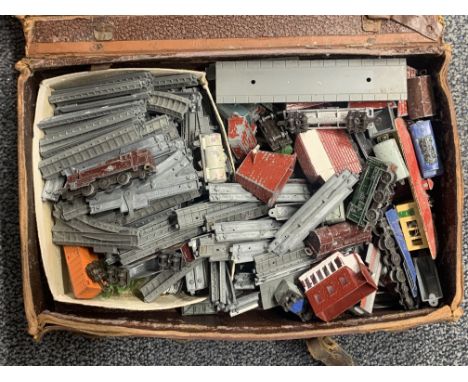 A leather case filled with Lone Star and Locos miniature model railway including locomotives, wagons, track, accessories, etc