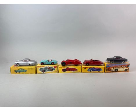 Five boxed (reproduction) Dinky Toys diecast model vehicles: model no. 524, no. 111, no. 549, no. 23D and no. 106.