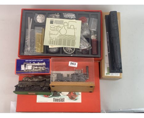 Seven various models of trains and steam engines. Five model kits and two static models.