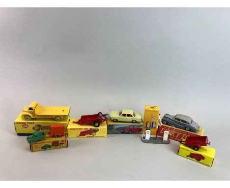 Seven various boxed Dinky model vehicles. Five are reproduction.