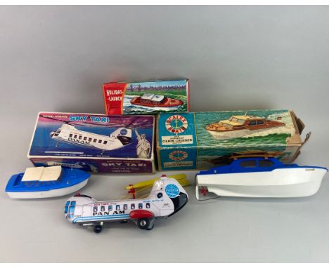 Three vintage boxed battery operated models consisting of Panam Sky Taxi by Haji, a Derwent Cabin Cruiser and a Guiterman Hol