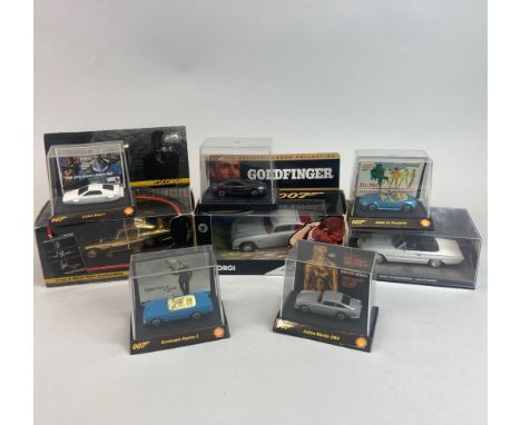 Eight boxed James Bond Corgi and other diecast model vehicles.