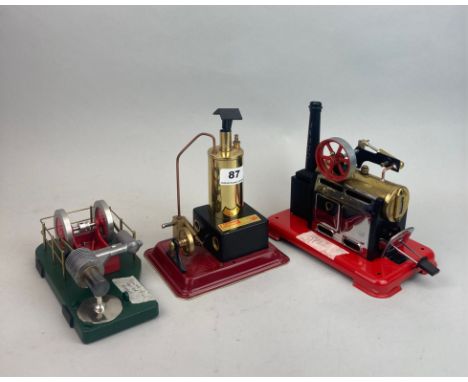 A Mamod SP2 static steam engine together with a Wilesco static engine and a Solar engine static model.